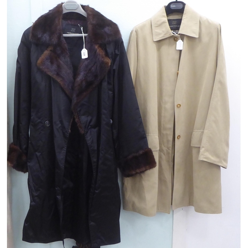 226 - A lady's Ramo Wear full length black fabric coat with a mink collar and cuffs  approx. size 10; and ... 