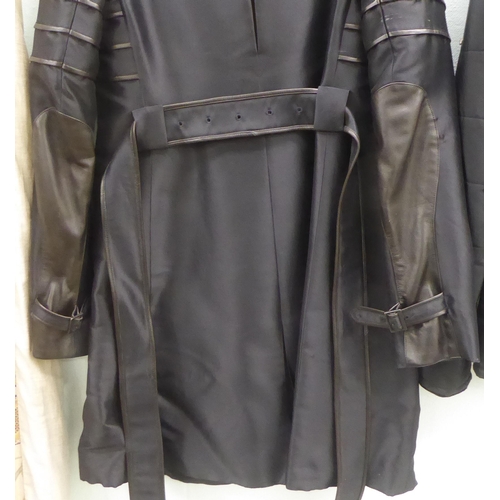 227 - A lady's Holmes & Yang black silk coat, trimmed with leather  size 4; and a Miller Thinsula... 