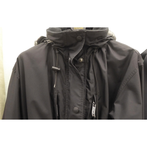 228 - A lady's Sweaty Betty black rainproof jacket  size XS; and a DKNY Active black fabric jacket wi... 