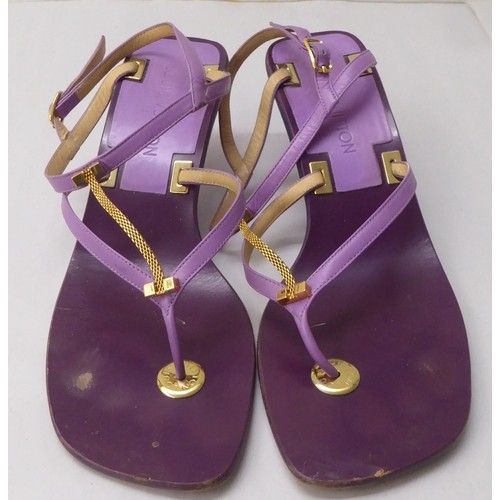 23 - A pair of ladies Louis Vuitton two tone purple leather, low heeled, open toe shoes  size 40.5 with a... 