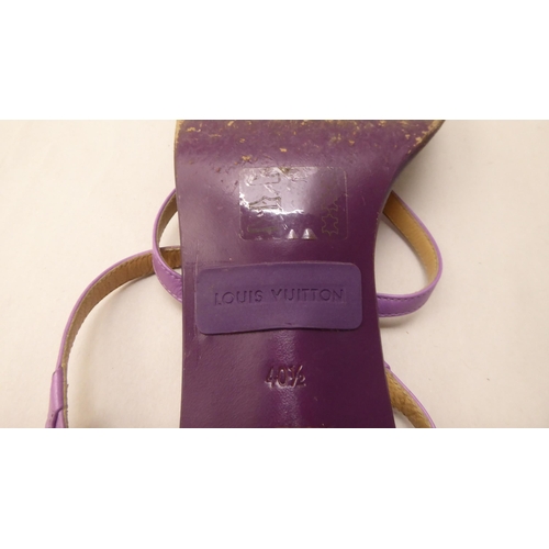 23 - A pair of ladies Louis Vuitton two tone purple leather, low heeled, open toe shoes  size 40.5 with a... 