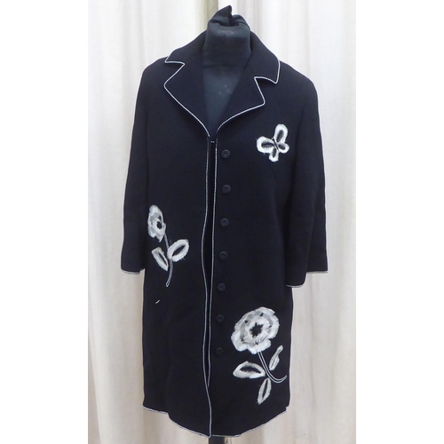 232 - A lady's Andrew GN black dress and jacket suit with white floral appliques  size 38