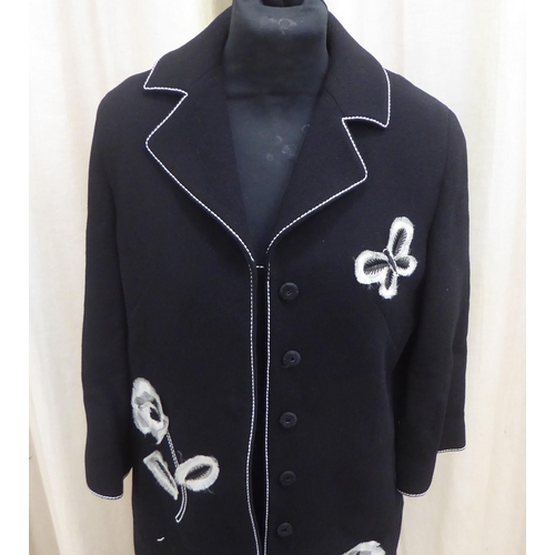 232 - A lady's Andrew GN black dress and jacket suit with white floral appliques  size 38