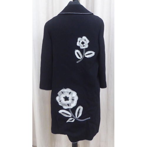 232 - A lady's Andrew GN black dress and jacket suit with white floral appliques  size 38