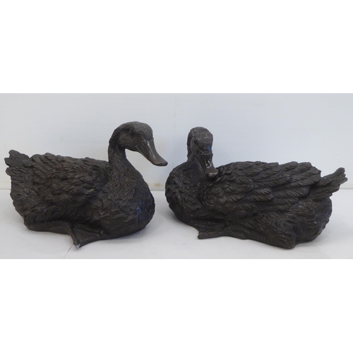 270 - A mixed lot: to include functional 20thC metalware and two composition model ducks  7