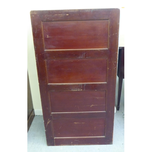 297 - A mid 20thC mahogany four drawer filing cabinet, on a plinth  52