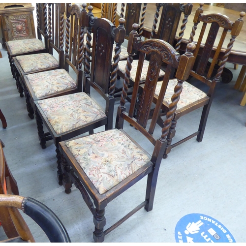 305 - Mainly early 20thC oak chairs: to include one with barleytwist uprights and a drop-in seat