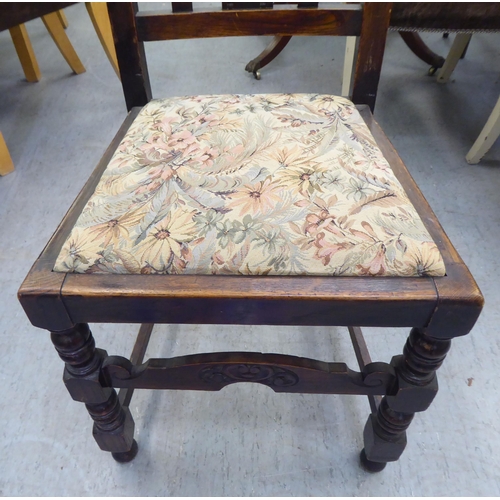 305 - Mainly early 20thC oak chairs: to include one with barleytwist uprights and a drop-in seat