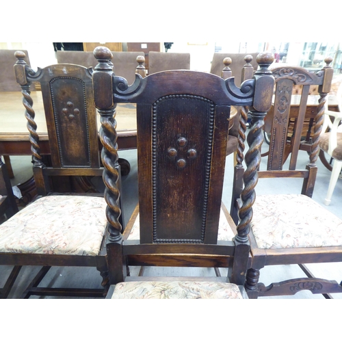 305 - Mainly early 20thC oak chairs: to include one with barleytwist uprights and a drop-in seat