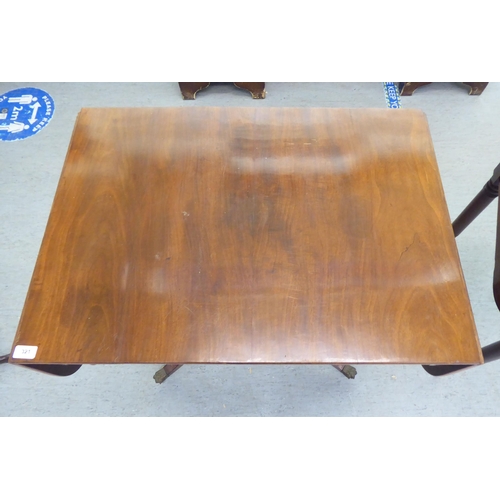 321 - 19thC and later furniture: to include a Regency reproduction of a mahogany sofa table, raised on spl... 