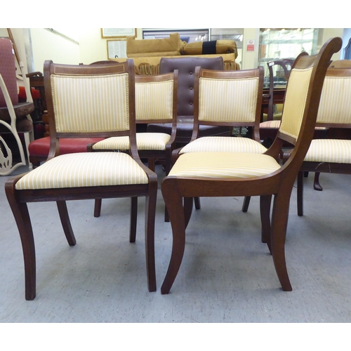 322 - A set of seven modern Regency style string inlaid mahogany dining chairs  comprising five standard/t... 