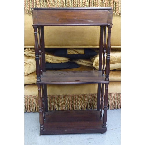 326 - A late 19thC rosewood three tier what-not, raised on turned column supports&nbsp; 38
