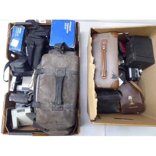 331 - Photographic equipment: to include 'The Button' polaroid land camera; and a Sigma Super 70 camera&nb... 