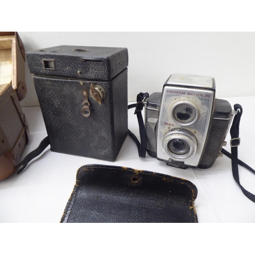 331 - Photographic equipment: to include 'The Button' polaroid land camera; and a Sigma Super 70 camera&nb... 