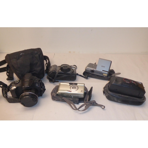 331 - Photographic equipment: to include 'The Button' polaroid land camera; and a Sigma Super 70 camera&nb... 