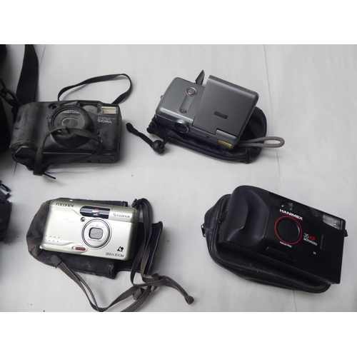 331 - Photographic equipment: to include 'The Button' polaroid land camera; and a Sigma Super 70 camera&nb... 