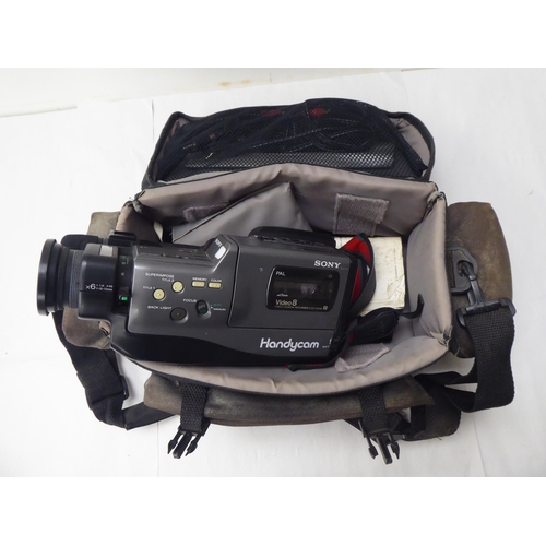 331 - Photographic equipment: to include 'The Button' polaroid land camera; and a Sigma Super 70 camera&nb... 