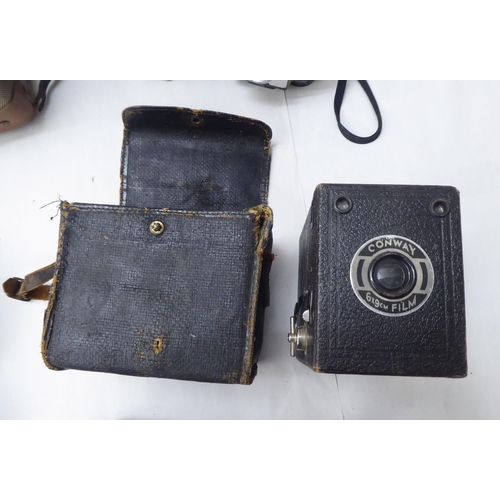 331 - Photographic equipment: to include 'The Button' polaroid land camera; and a Sigma Super 70 camera&nb... 