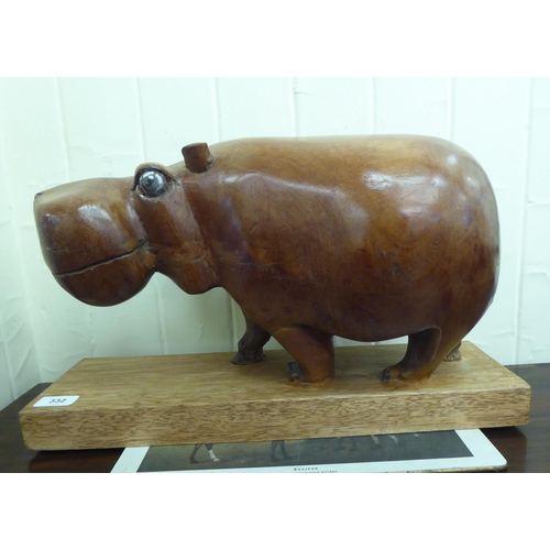 332 - A modern carved and painted hardwood model hippo 10