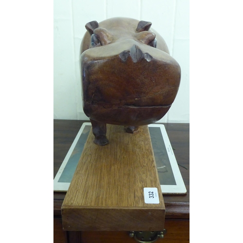 332 - A modern carved and painted hardwood model hippo 10