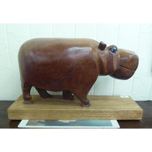 332 - A modern carved and painted hardwood model hippo 10
