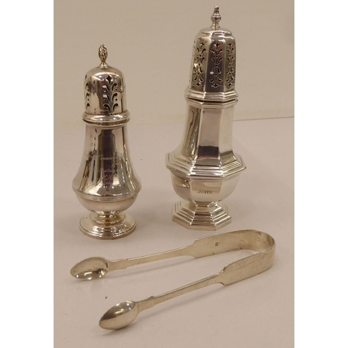 334 - A silver plated caster; another in silver; and a pair of silver sugar tongs  mixed marks