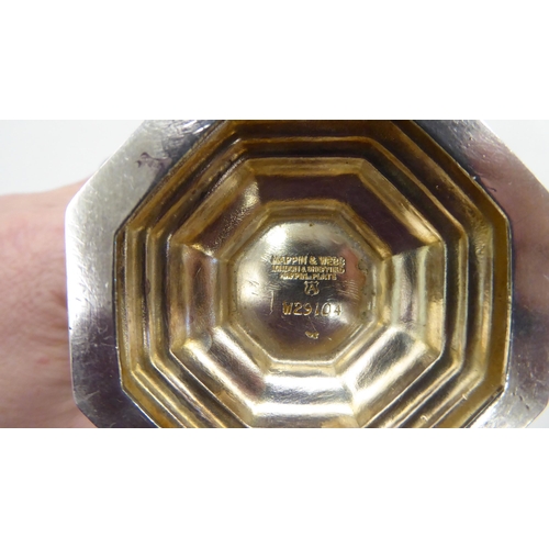 334 - A silver plated caster; another in silver; and a pair of silver sugar tongs  mixed marks