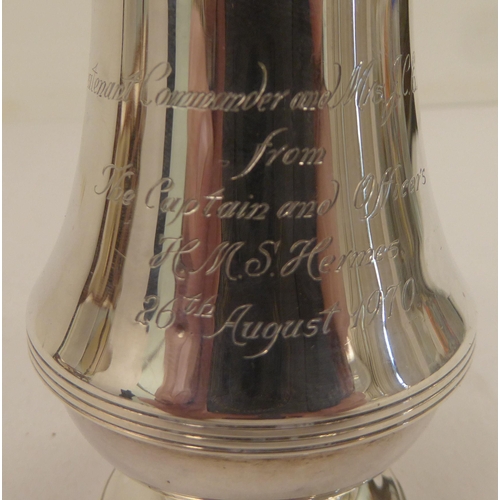 334 - A silver plated caster; another in silver; and a pair of silver sugar tongs  mixed marks