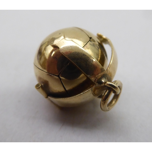335 - A gold plated Masonic puzzle ball