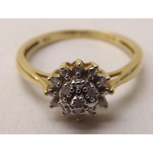 340 - A 9ct gold diamond cluster ring