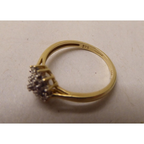 340 - A 9ct gold diamond cluster ring