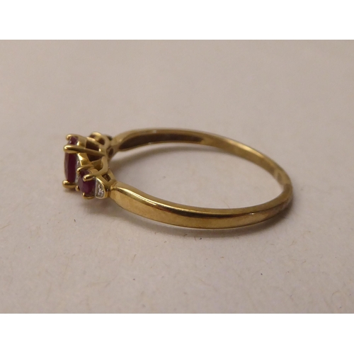 342 - A 9ct gold ruby and diamond set ring