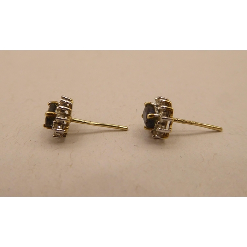 346 - A pair of 9ct gold sapphire and diamond set earrings