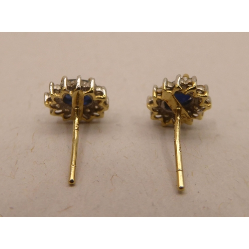 346 - A pair of 9ct gold sapphire and diamond set earrings