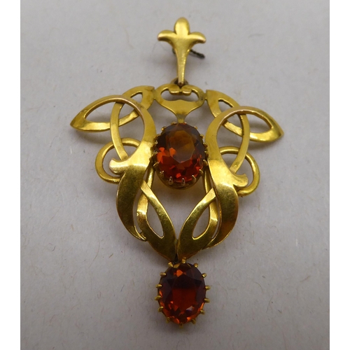 347 - A 9ct gold Art Nouveau inspired pendant, set with two citrines