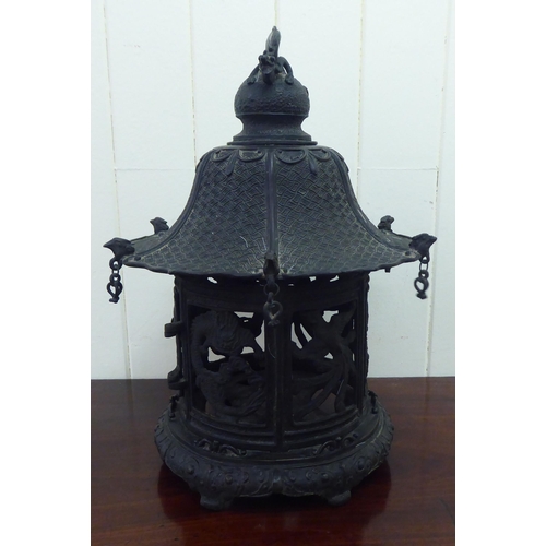352 - A Chinese bronze finished, metal hanging lantern of pagoda design  14