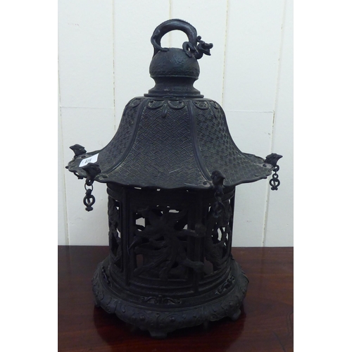 352 - A Chinese bronze finished, metal hanging lantern of pagoda design  14