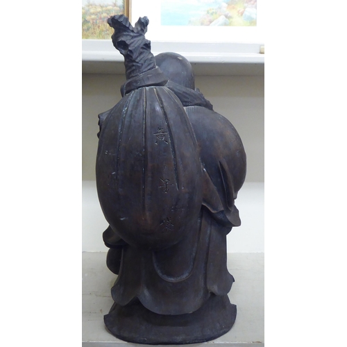 353 - A resin model, a standing Buddha&nbsp; 24