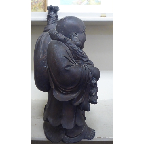 353 - A resin model, a standing Buddha&nbsp; 24