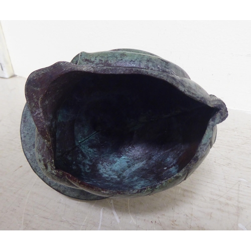 356 - Oriental collectables: to include a pair of bronze finished metal stupas  9