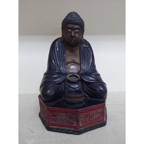 356 - Oriental collectables: to include a pair of bronze finished metal stupas  9