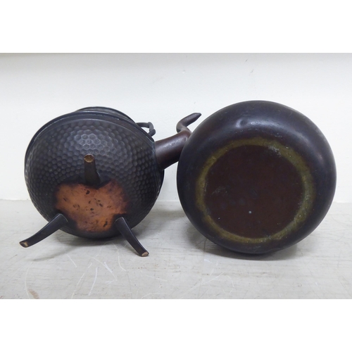 356 - Oriental collectables: to include a pair of bronze finished metal stupas  9