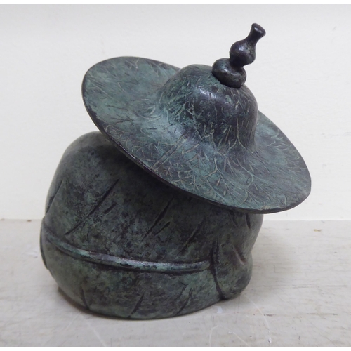 356 - Oriental collectables: to include a pair of bronze finished metal stupas  9