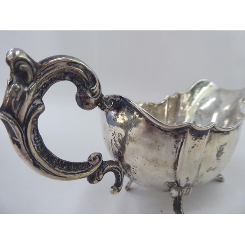 380 - Silver and white metal collectables: to include a sauce boat, on splayed feet&nbsp; Sheffield marks ... 