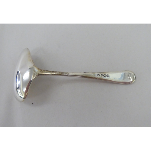 380 - Silver and white metal collectables: to include a sauce boat, on splayed feet&nbsp; Sheffield marks ... 