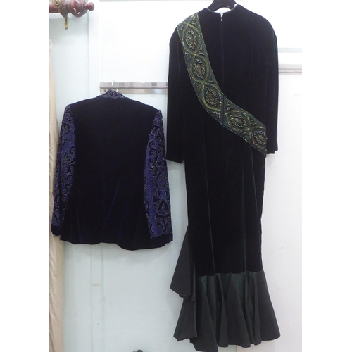 383 - A Gilly Jacques mauve crushed velvet and embroidered sleeved blazer; and a full length dark green dr... 