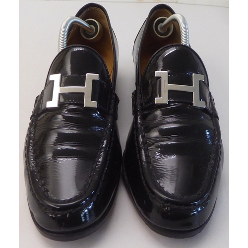 5 - A pair of ladies Hermes black leather, low heeled loafers  size 39