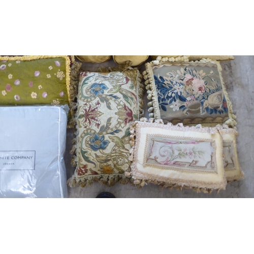 53 - Variously sized, patterned and fabric scatter cushions 