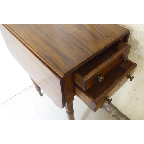 62 - A late 19thC mahogany Pembroke work table with two end drawers, raised on ring turned, tapered legs ... 