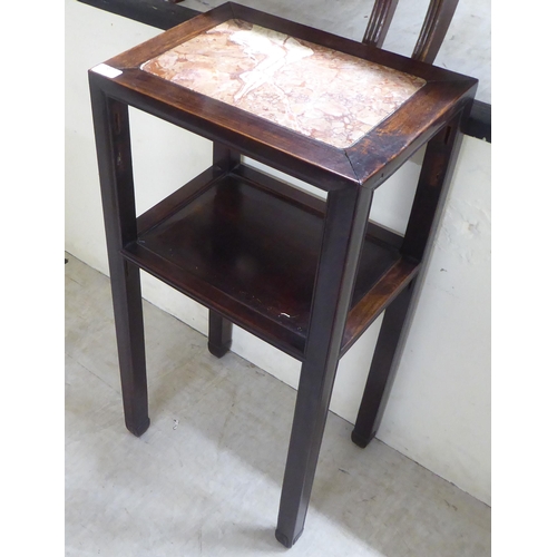 67 - A mid 20thC Chinese fruitwood two tier hall table, raised on square legs  32